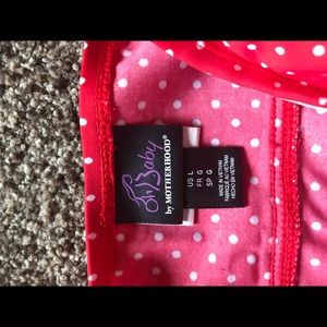 Maternity swim suit by OhBaby Motherhood.